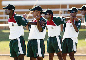 Members of the Bangladesh cricket team perform stretching exercise 