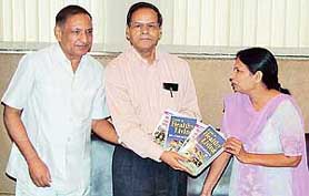 The Vice-Chancellor of Panjab University, Prof K.N. Pathak, releases a set of two books -- 'Healthy Living' and �Better Health after 50� -- written by Dr Meenal and Dr R. Kumar at the Vice-Chancellor�s office in Chandigarh on Friday