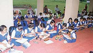 School students from Chandigarh, SAS Nagar and Panchkula create art works during the on-the-spot painting contest organised at Forest Hill Resort this morning.