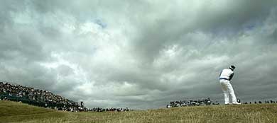 Sweden's Fredrik Jacobson chips onto the 16th green 