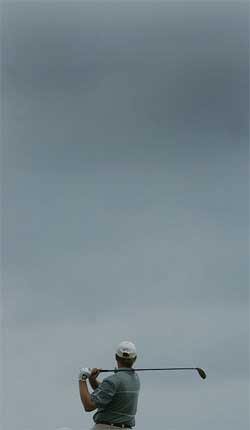 South Africa's Ernie Els watches the flight of his shot