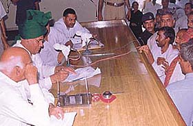 Haryana Chief Minister Om Prakash Chautala presiding over the monthly meeting of the Grievances Committee at Bhiwani