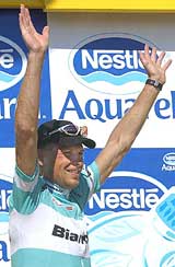 Jan Ullrich of Germany celebrates after winning the 12th stage
