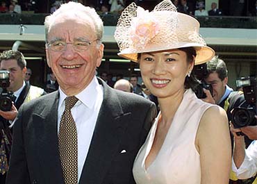 Australian-born media magnate Rupert Murdoch and his wife Wendy Deng