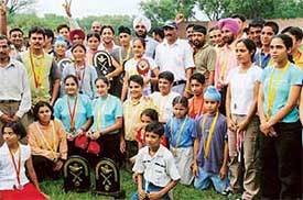 Winners of the Chandigarh State Shooting Meet smile after the prize distribution function