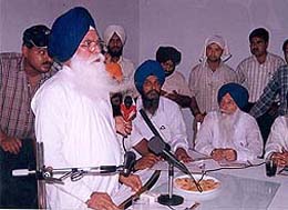 Prof K.S. Badungar addresses members of the executive committee of the SGPC before submitting his resignation as committee chief in Patiala