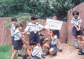 Students of Children's Valley School, Preet Vihar, demonstrating the process water cycle to spread awareness about 'rainwater harvesting'.