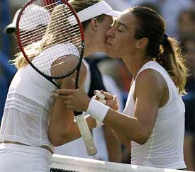 Francesca Schiavone of Italy, congratulates Meghann Shaughnessy of the USA after she won their match 