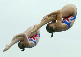 Great Britain�s Tandi Gerrard and Jane Smith dive in the women�s synchronised three metres preliminaries 