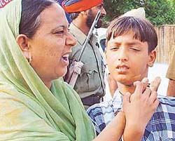 Gagandeep Singh along with his mother, Gurnaam Kaur, at the SP�s office in SAS Nagar 