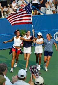 US tennis stars Alexandra Stevenson, Meghan Shaughnessy, Chanda Rubin and Lisa Raymond take a victory lap 