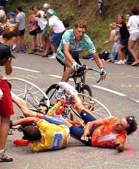 US Postal Service team rider Lance Armstrong crashes after his handlebars caught on a plastic bag