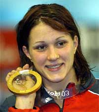 Germany's Hannah Stockbauer displays her gold medal after winning the women's 400 meter freestyle final