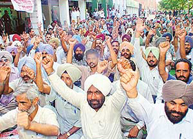 Members of the Democratic Teachers Front, Punjab, protest in support of their demands, in Sector 17, Chandigarh