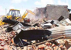 Encroachments removed from more than 35 acres meant for the development of Industrial Area, Phase III, in Raipur Kalan village, near railway station, in Chandigarh on Tuesday.