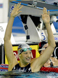 Germany�s Antie Buschschulte celebrates her victory at the 100 metre backstroke semifinal 