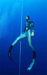 World champion freediver Tanya Streeter swims up to the surface at the Variable Weight Freediving