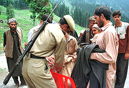 Amarnath pilgrims undergo security check near Pahalgam 