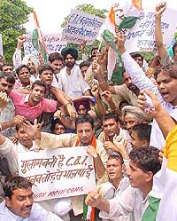 Indian Youth Congress President Randeep Singh Surjewala leads his supporters as they raise slogans against the �sellout� of the rule of law and �constitutional norms� by the CBI during a demonstration in front of CBI headquarters 