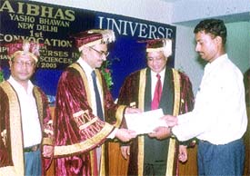 A student being awarded his degree at the first convocation of the Amity Institute of Behavioural Health and Allied Sciences