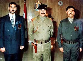 Saddam Hussein is flanked by his two sons Uday and Qusay 