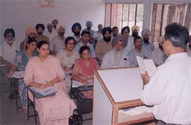 Teachers of vocational studies from government schools attend a workshop on entreneurship development at Government Model Senior Secondary School