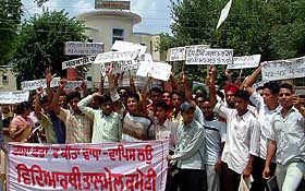 Students Coordinate Committee members hold a protest in front of the Government Rajindra College 