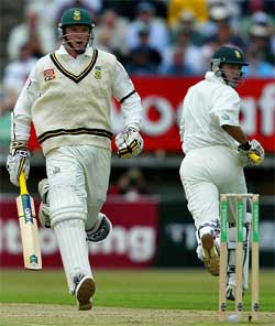 South African openers Graeme Smith and Herchelle Gibbs run for a quick single
