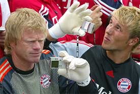 Germany and FC Bayern Munich goalkeeper Oliver Kahn takes a self-portrait with a digital camera 
