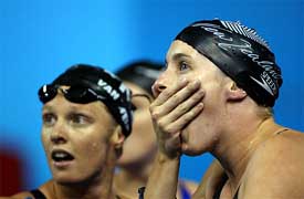 New Zealand's 4x200 metres freestyle relay team members Hannah McLean and Elizabeth Van Welie react to the news of their disqualification