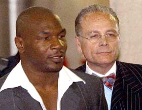 Mike Tyson and his lawyer Mel Sachs enter Brooklyn criminal court 