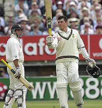 South African captain Graeme Smith celebrates his century