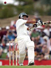 Bangladeshii batsman Habibal Bashar swings his bat at a ball from Australia's Glenn McGrath 