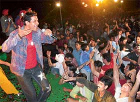 Audience dance to the tune of Shankar Sahni, who performed at the Chandigarh Press Club