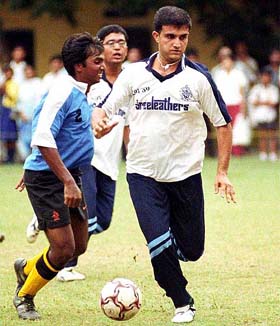 Indian cricket captain Sourav Ganguly in action during a soccer match