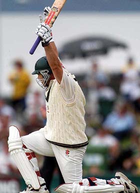 Australian batsman Darren Lehmann celebrates his century