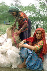 Monsoon victims with their belongings