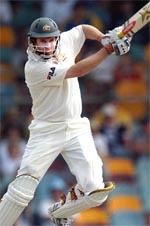 Australian batsman Martin Love plays a stroke on the way to his maiden Test century