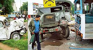 A Punjab DIG�s car (left) that rammed into an Army truck carrying schoolchildren at the Sectors 27 and 28 traffic lights on Monday 
