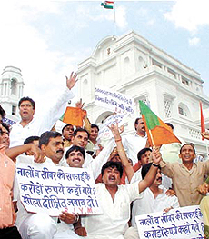 Activists of BJP Yuva Morcha protesting against the Sheila Dikshit government on the issue of power shortage and sewerage at Delhi Vidhan Sabha in the Capital on Monday.