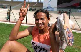 Punjab athlete Madhuri Singh flashes a victory sign 