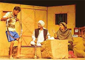 A scene from �Kesro� being staged during the Balwant Gargi drama festival at Tagore Theatre