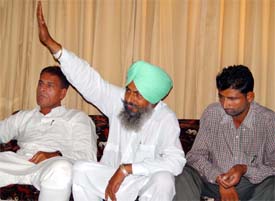Mr Dalwara Singh addresses a press conference in Chandigarh
