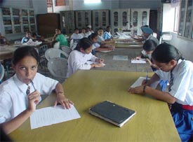 Participants at a district-level science contest appear for a written test at Government Model Senior Secondary School, PAU
