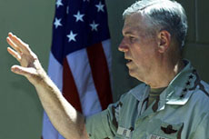 US General Richard B. Myers, chairman of the Joint Chiefs of Staff, speaks during a news conference at Bagram Airbase