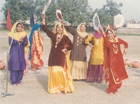 Students of a local college perform giddha on the eve of Teej celebrations in Doraha