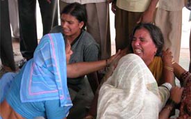 Vidyawati, wife of Jagdish Jindal and mother of Bablu, who died in an accident while returning from Chintpurni in Himachal Pradesh, being consoled by her relatives