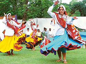 Time for celebrations: Enthusiastic youngsters dance at the Haryana Raj Bhavan during Teej celebrations in Chandigarh on Friday. 
