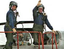 Defence Minister George Fernandes comes out of the cockpit of a MiG-21 after a ride with Wing Commander N Harish at Air Force Station, Ambala