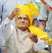 Mr Atal Bihari Vajpayee gestures at a function organised by the BJP Kisan Morcha in New Delhi on Saturday.